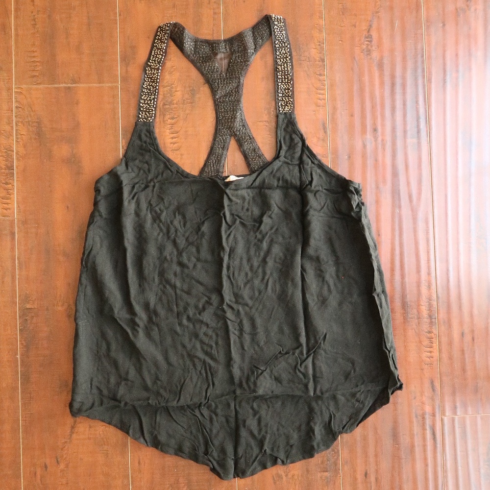 Black top with embellished straps